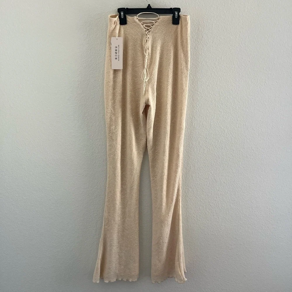 NWT OH POLLY | Zuni Lace Up Back High Waisted Flare Trousers in Cream | Size 10